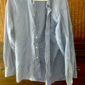 Then he’s in blue and black checkered shirt wrinkle free 16 1/2 large